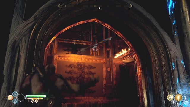 Freeze the middle set of spikes at the top position to break the chains in A Path to Jotenheim in The Journey in God of War.