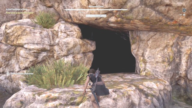 Climb into the cave entrance to find and acquire the spear in In the Footsteps of Gods in Assassin's Creed Odyssey